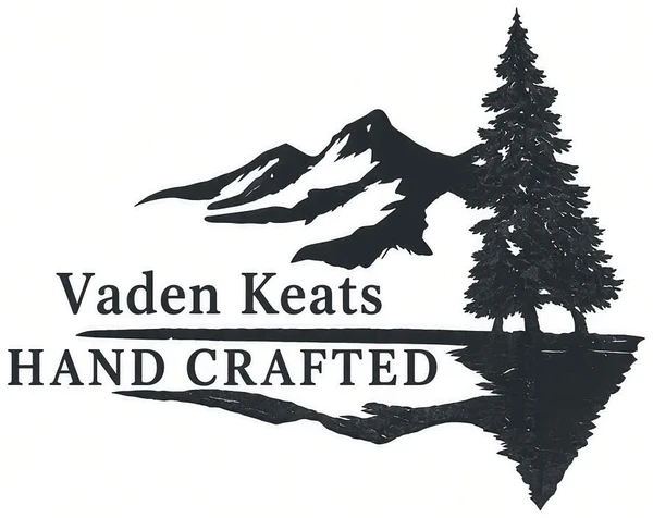Vaden Keats Hand Crafted maker mark with mountains, pine trees, and water reflection